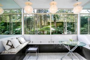 Inspiration for a contemporary sunroom in Sydney with light hardwood floors and a standard ceiling.