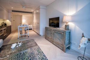 Inspiration for a mid-sized contemporary open concept living room in Sydney with white walls, light hardwood floors and no fireplace.